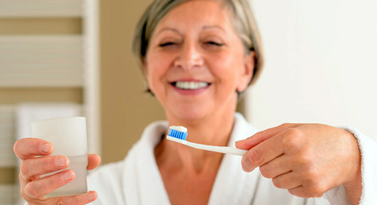 happy smile and toothbrushing