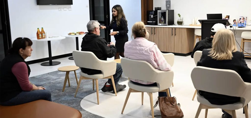 The lounge, rearranged. Coffee on, chairs in a semicircle